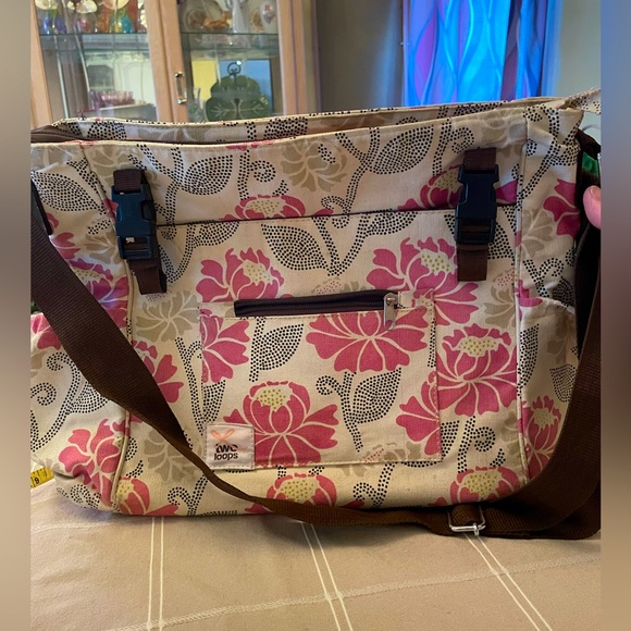 Two Loops Diaper Bag in a Pink Floral Pattern. - Picture 3 of 12